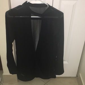 Sheer bathing suit coverup.